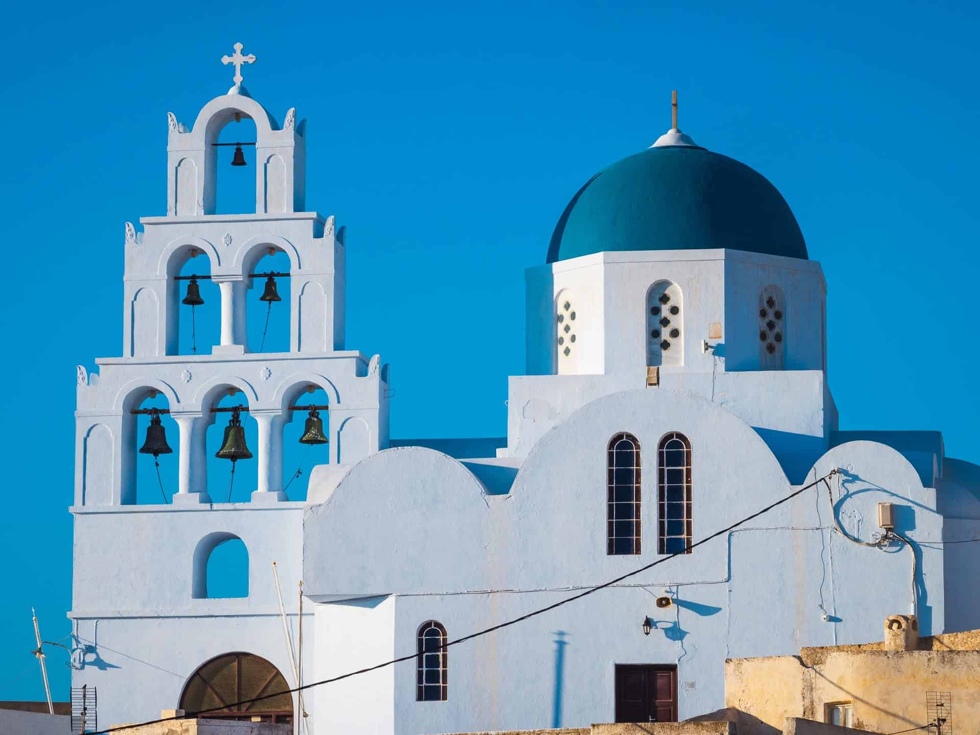 pyrgos santorini blue dome and bells