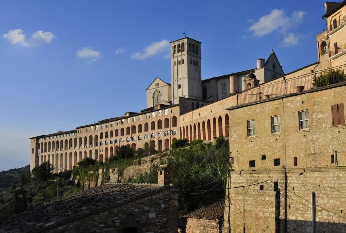 The long row of arches makes it look like a fortress.