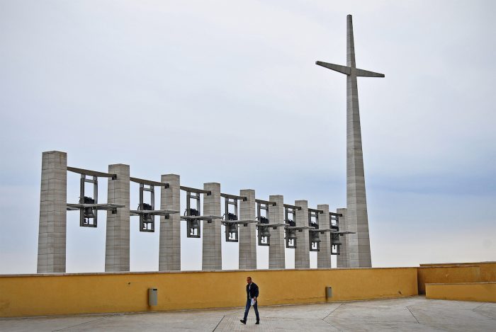 Concrete Cross and bell tower.