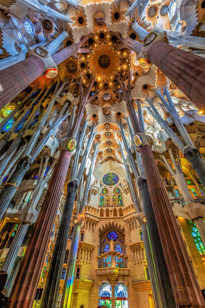 The view of the altar with its magnificent stained glass windows.