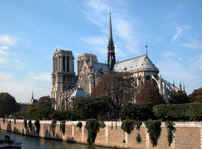 The tall spire stands tall above the city's landscape. It was destroyed in the 2019 fire but will be rebuilt in all its former glory.