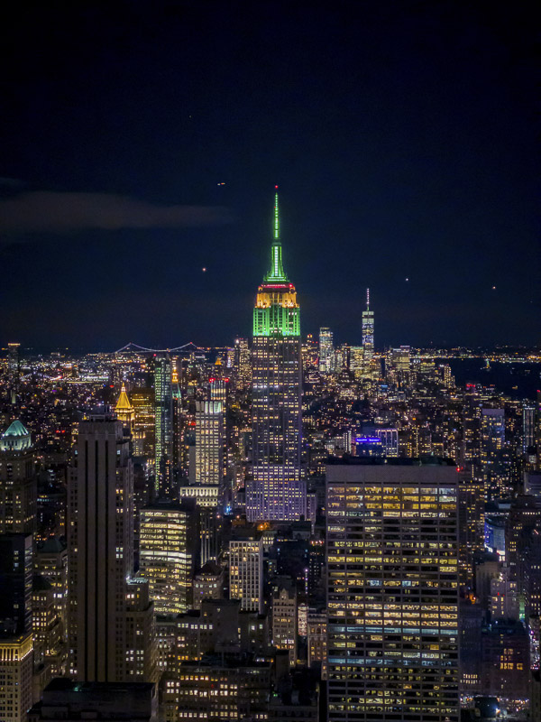 view of new york city at night from top of the rock. 