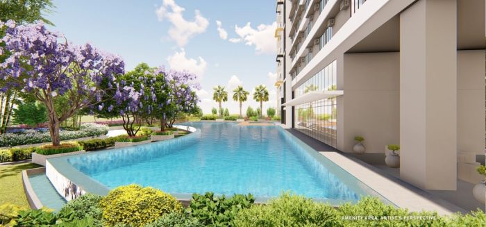 The amenity area on the 5th floor showcases pools bordered by lush landscaping, a children’s play area, and both indoor and alfresco seating areas