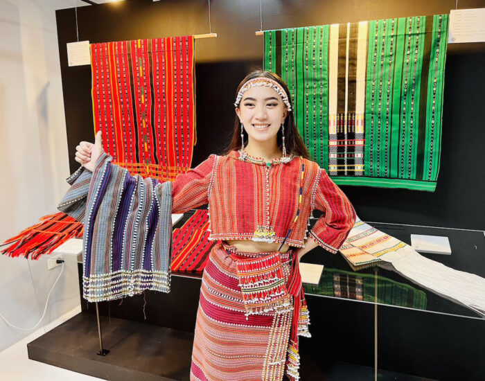 A student wearing woven fabric from Kalinga