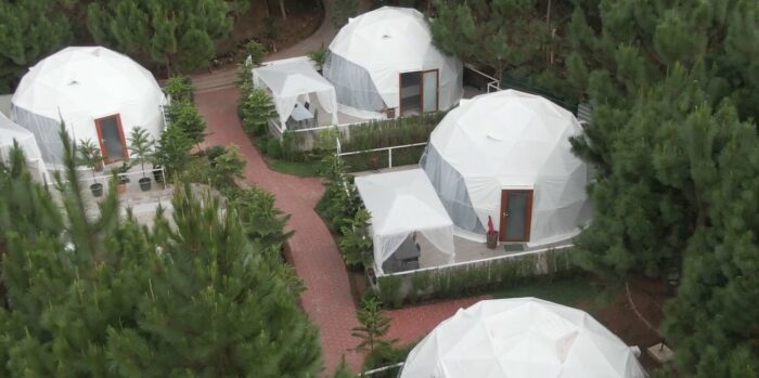 Taglucop offers a cozy glamping experience with their geodesic glamping domes.