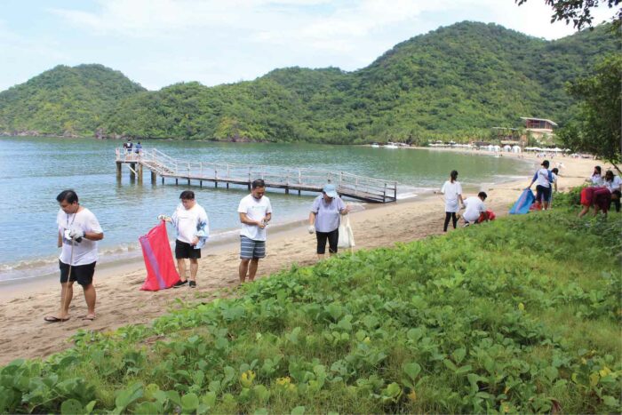 Coastal cleanup participants from Pico de Loro Beach and Country Club and Pico Sands Hotel team members, select guests, and Yanarra Watersports and Tour Services at Pico Beach.